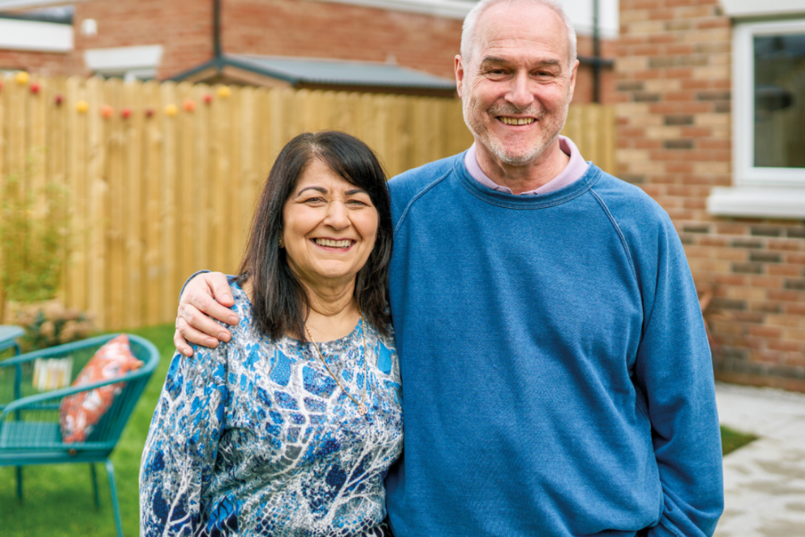 Co Own for Over 55s customers smiling in garden 1040x760px