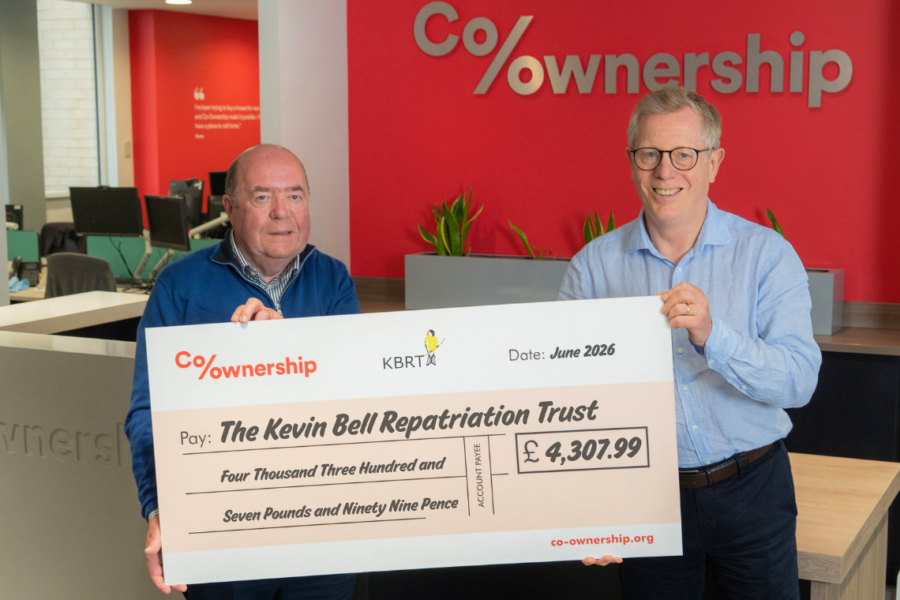Kevin Bell Trust representative collecting fundraising cheque