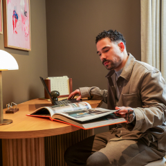 Miguel at desk 240x240