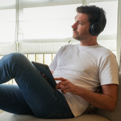 Piaras listening to headphones